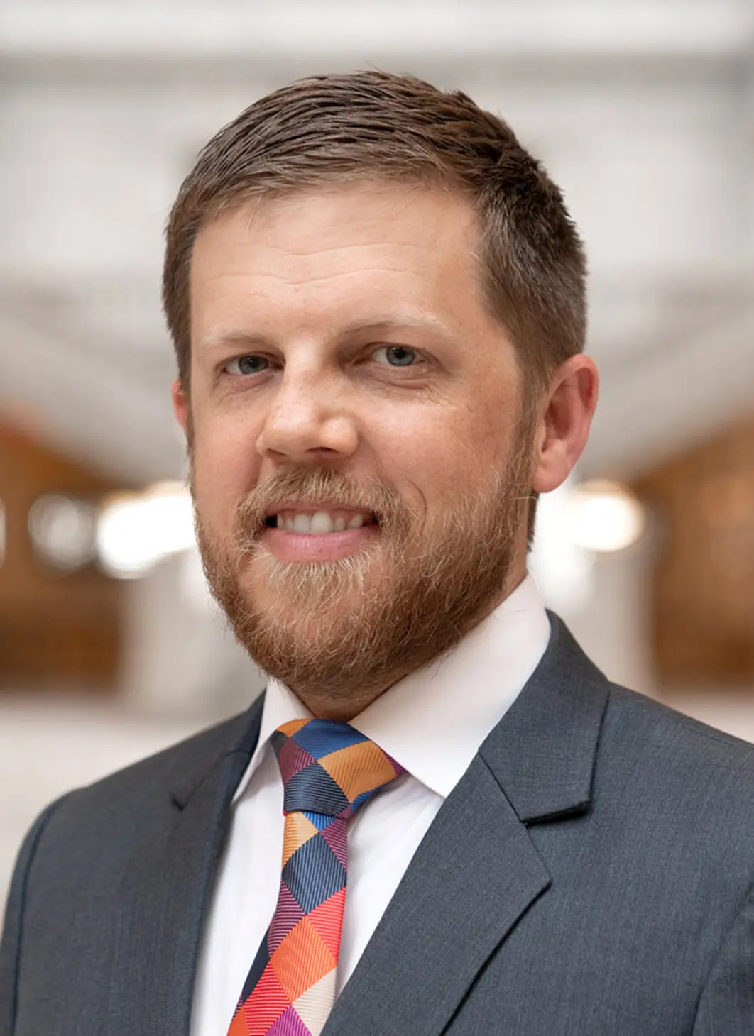 Connor Boyack portrait in a suit and tie.
